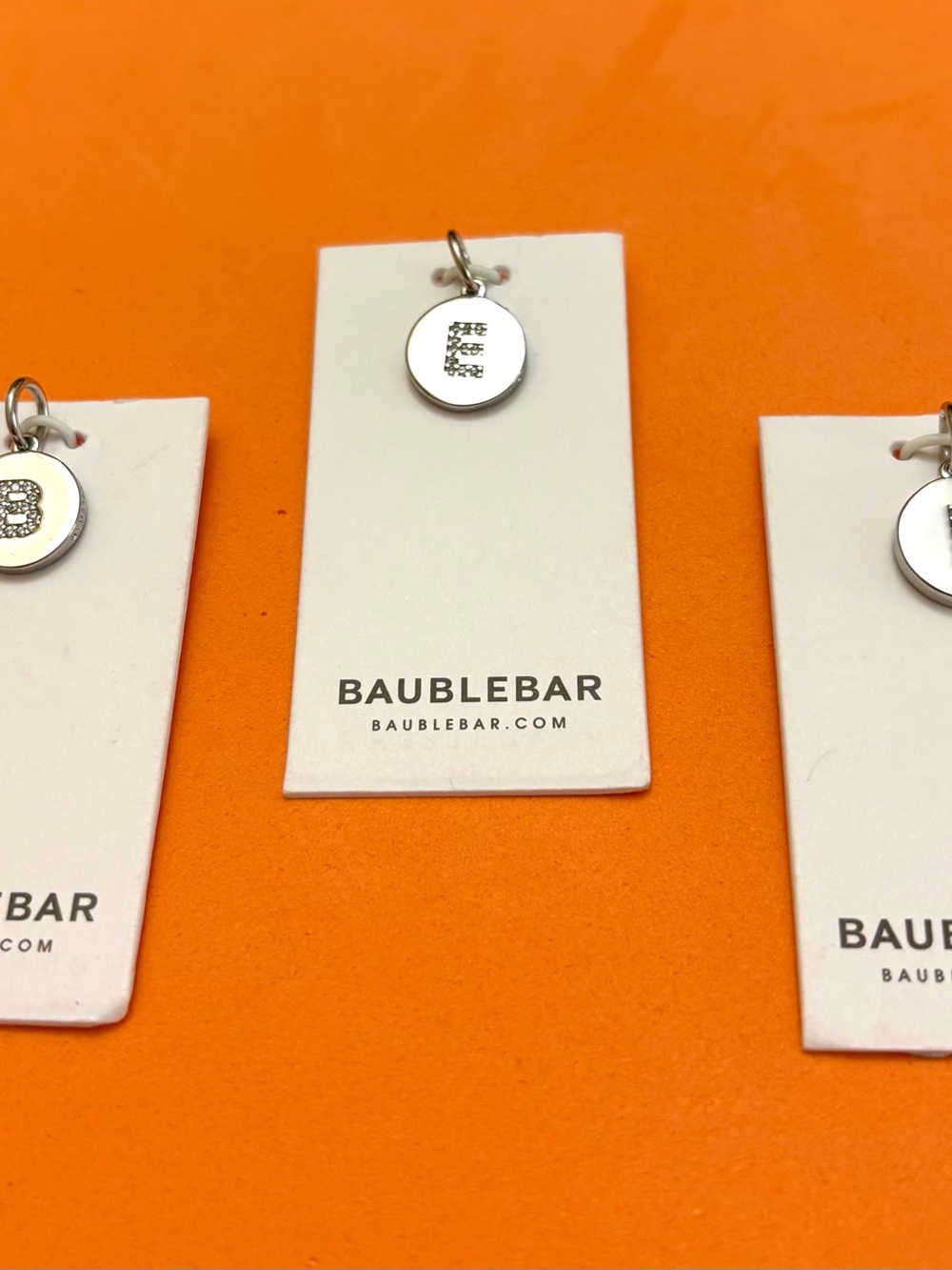BaubleBar Silver Initial Charms – Personalized Letter Pendants.